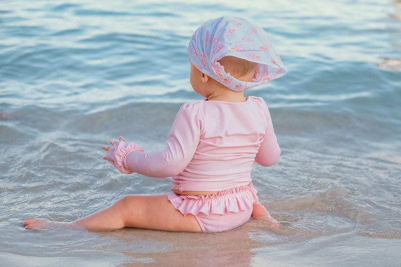 Quel maillot de bain anti UV pour mon bébé de 1 an ?