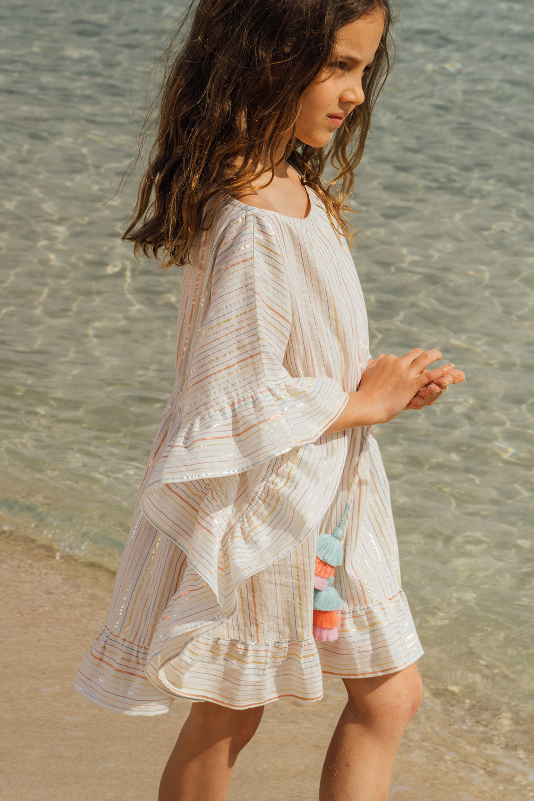 Lurex striped cover-up with pompoms