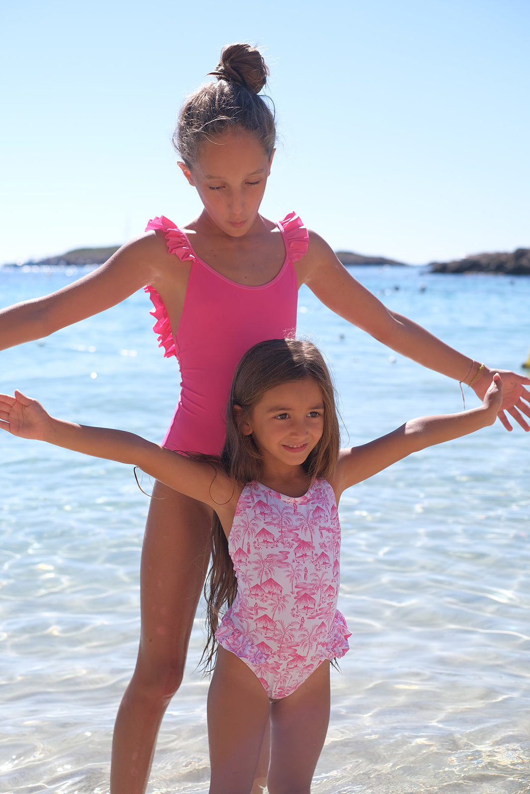 Girl's one-piece swimming suit with pink vahiné motif