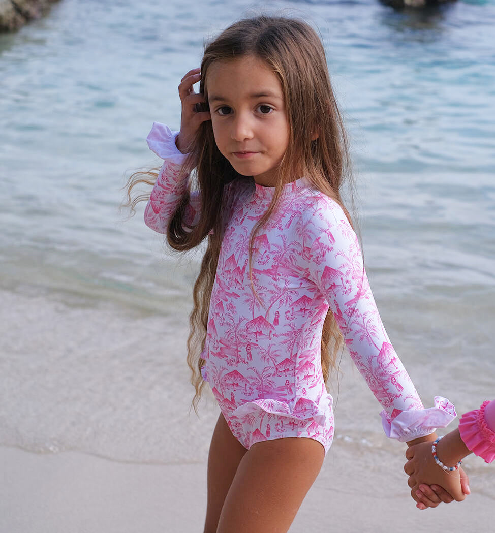 Long-sleeved baby swimming costume in pink vahine pattern